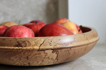 Spalted Beech wooden bowl with apples.